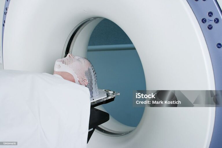 Man Receiving CAT Scan X-Ray of Head - Horizontal