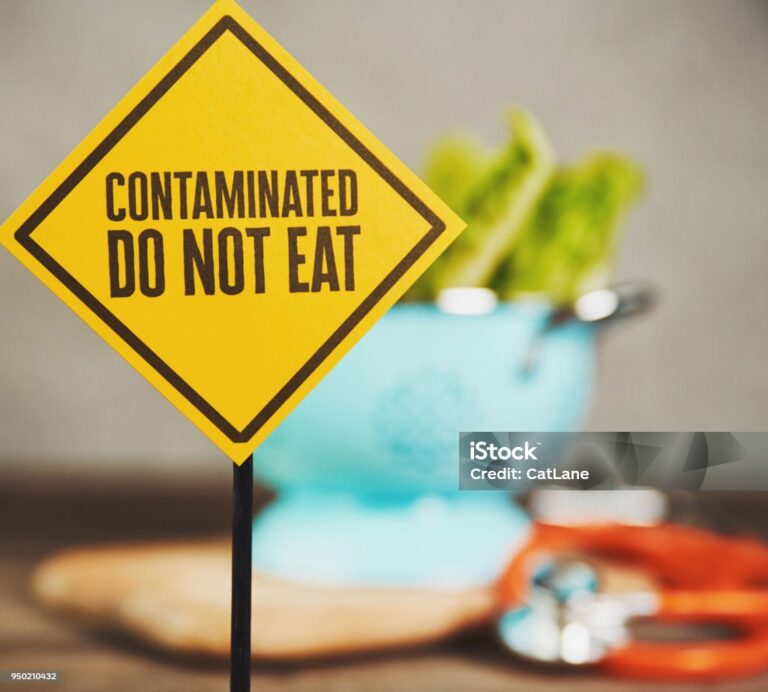 Contaminated Lettuce with Warning Sign