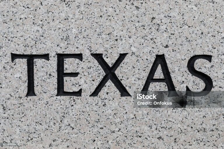 The Word Texas Written on Concrete